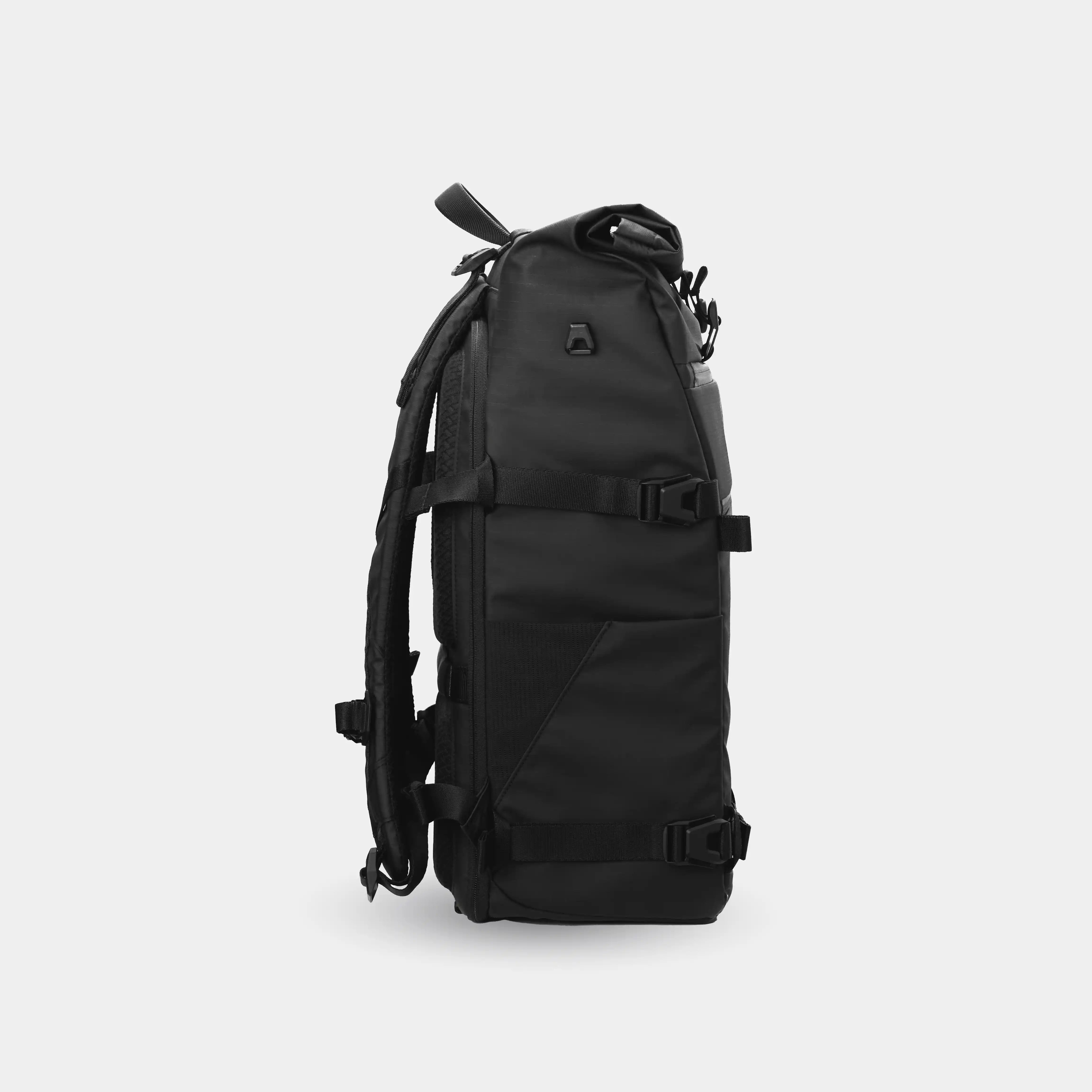 Black backpack on a light gray background