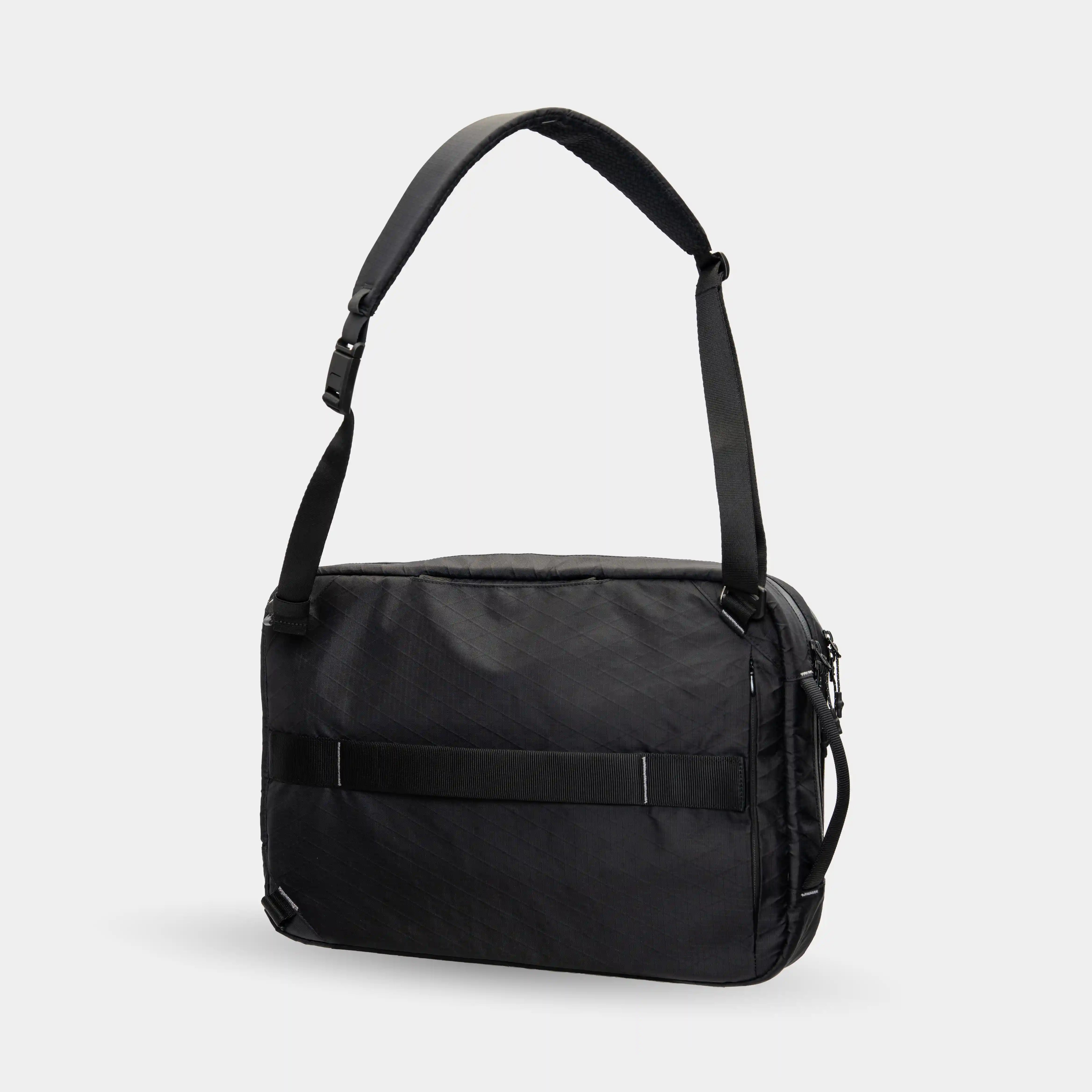 Laptop bag that transforms into backpack, crossbody, or professional briefcase.