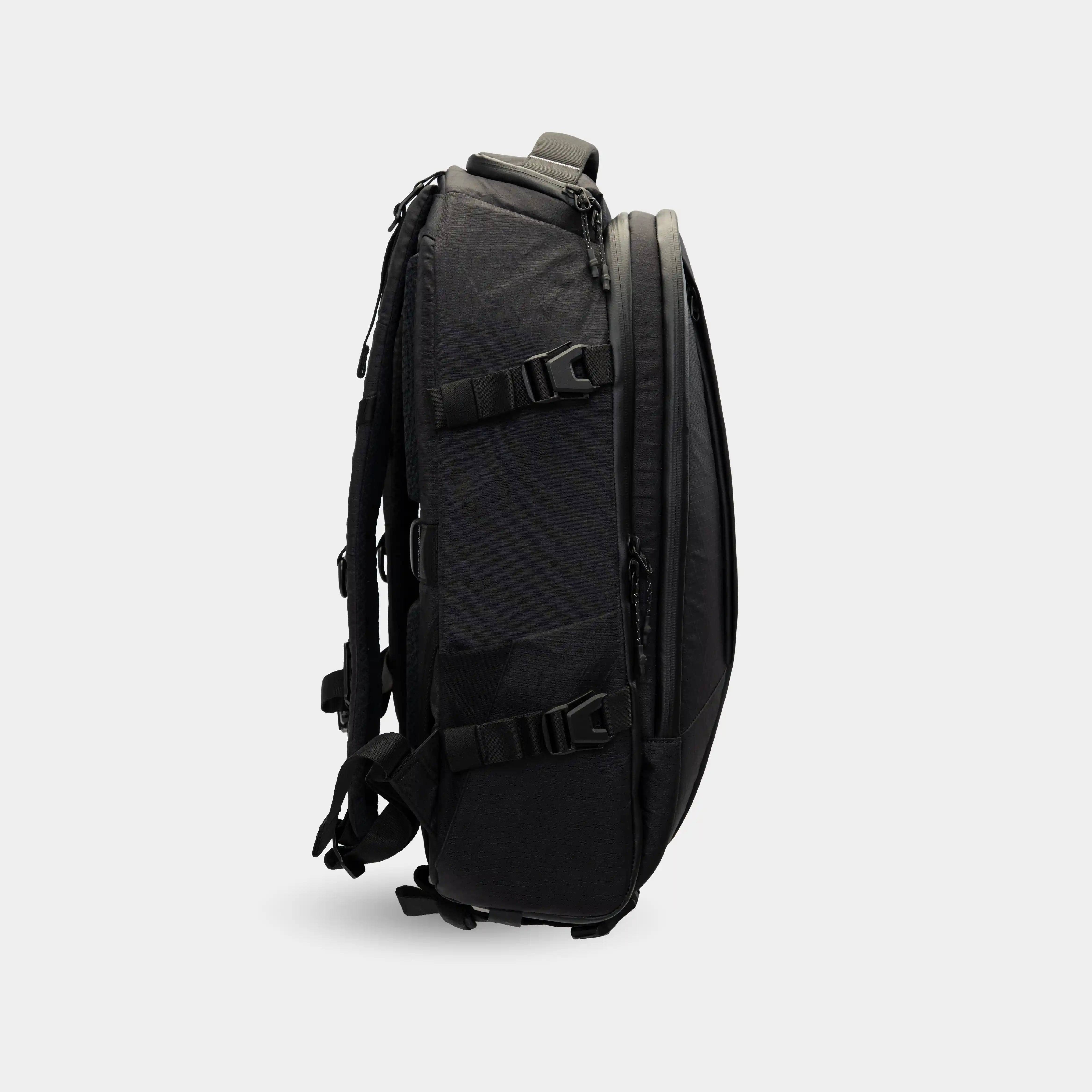 Slimpak 28L camera bag with structured dividers and waterproof body.