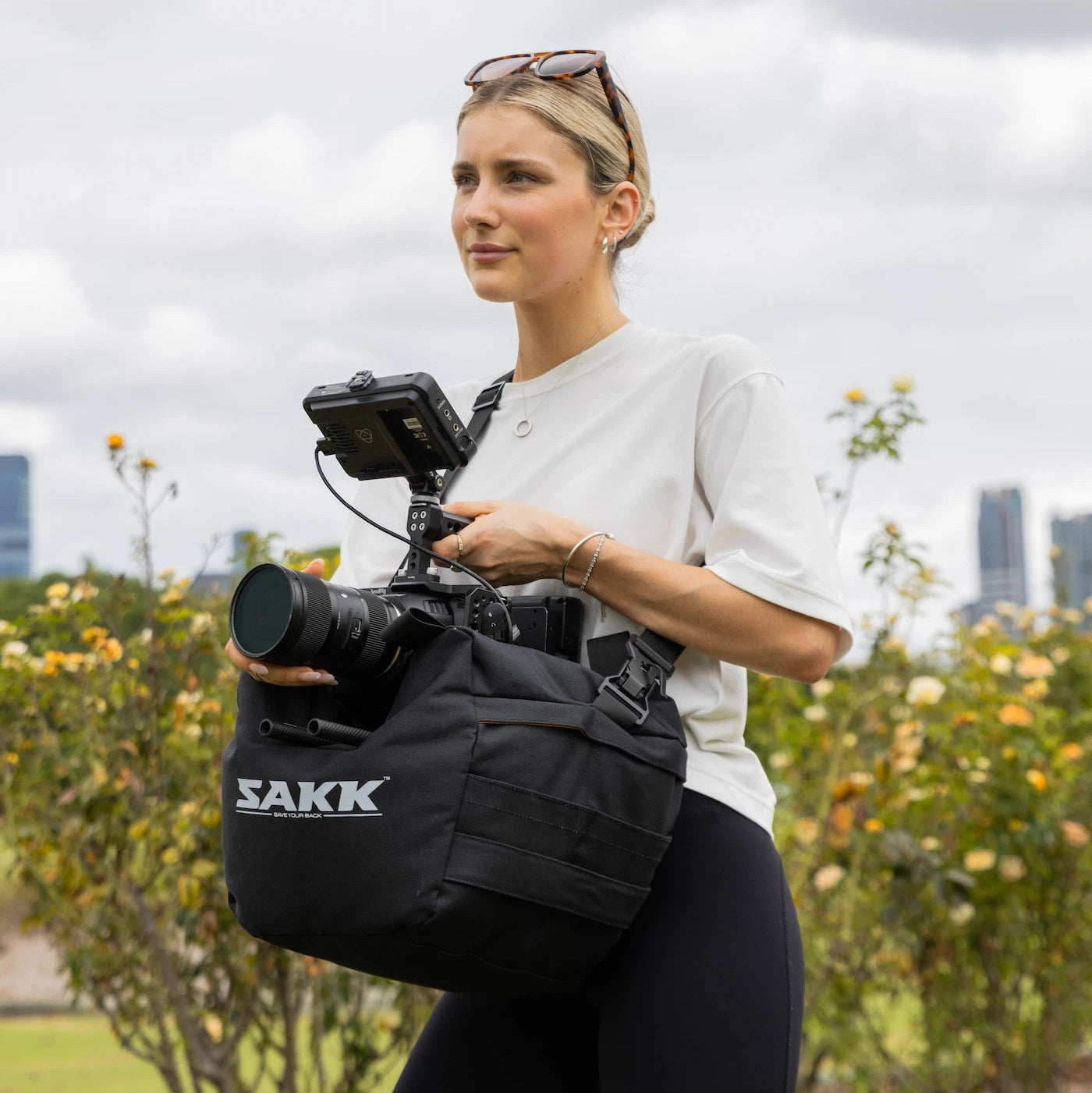 Soft camera saddle that reduces shake during handheld or surface-mounted shots.