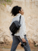 Unisex 9L sling for city creators and business travelers. Weatherproof finish with gear slots.