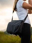 camera sling bag on model