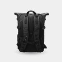 Black backpack on a light gray background