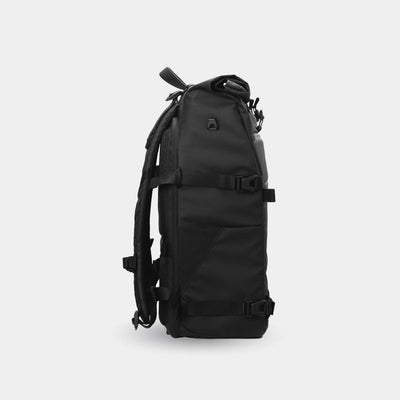 Black backpack on a light gray background