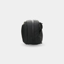 Black backpack on a light gray background