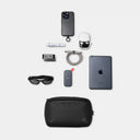Collection of electronic devices and accessories on a white background