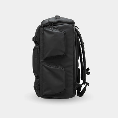 Black backpack on a light gray background