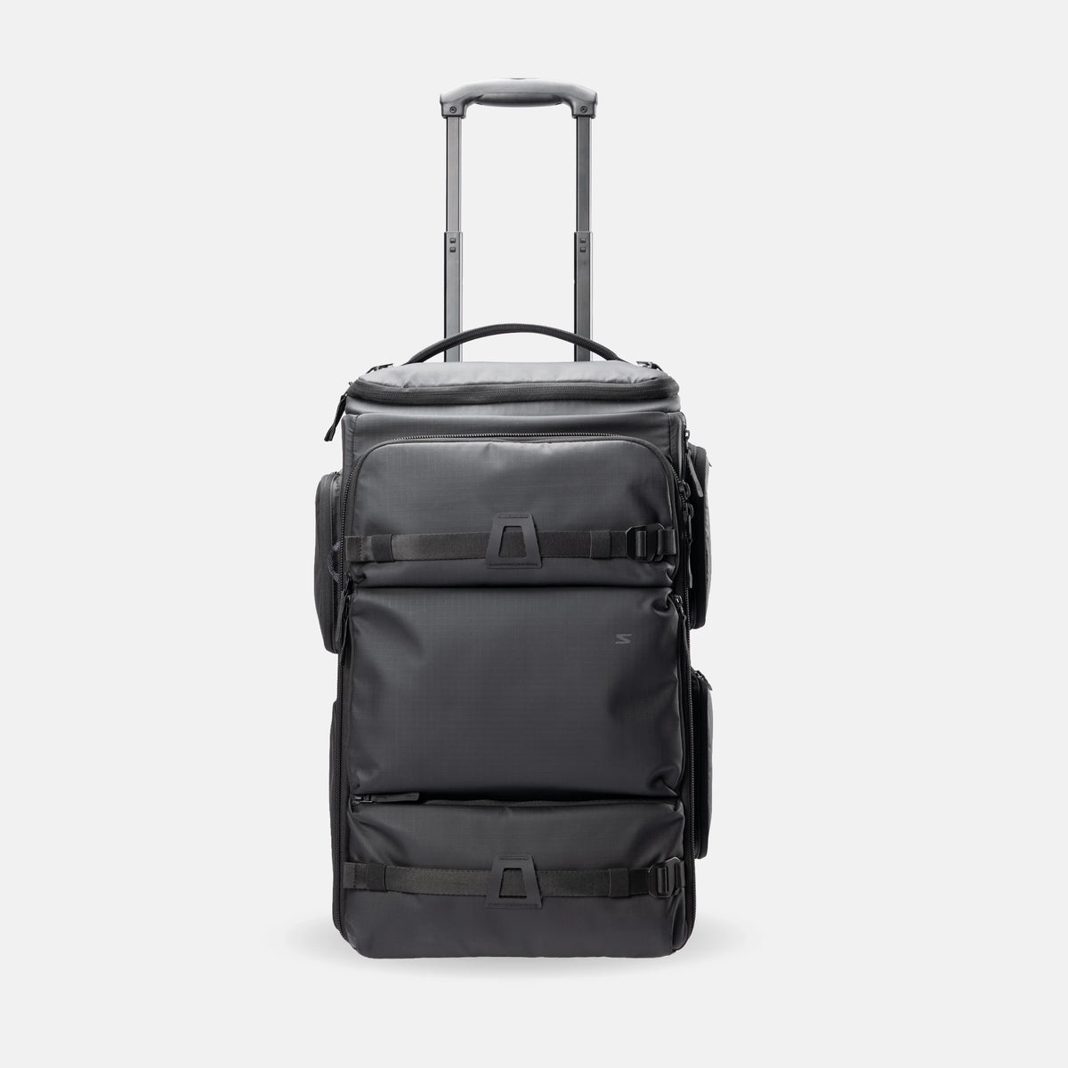 A black rolling duffel bag with an extended telescoping handle, shown from the front against a light gray studio background.