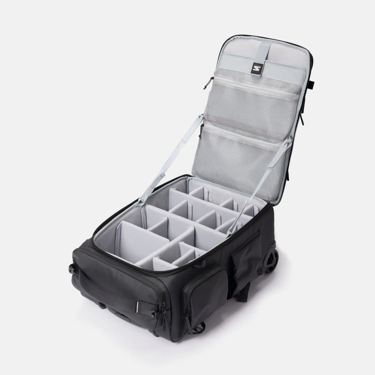 An open black rolling travel organizer bag with gray interior compartments and organizer dividers, shown on a clean light gray background.