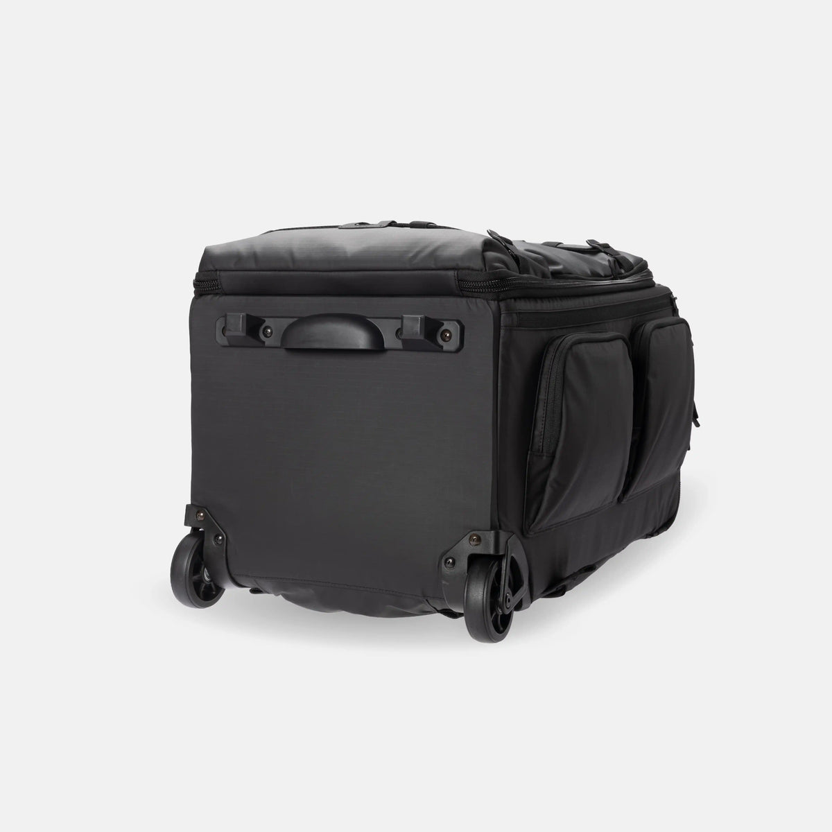 A black soft-sided rolling duffel bag with dual spinner wheels, a top zip closure, and side pockets, photographed on a clean light gray studio background.