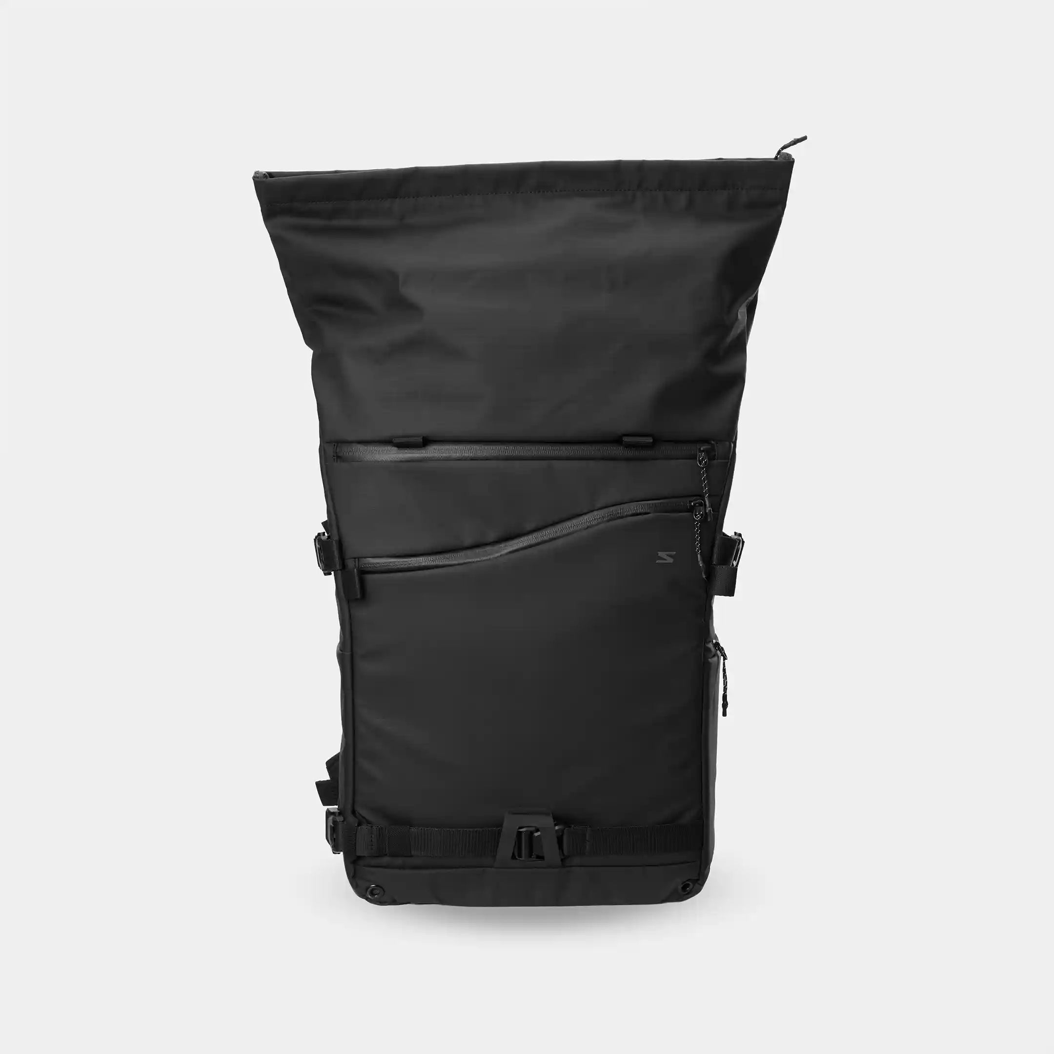 Black backpack on a light gray background