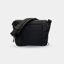 Minimal laptop and camera sling for commuting creators
