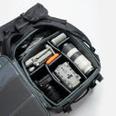 Expandable rolltop backpack with versatile capacity for work, travel, and daily use.