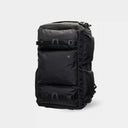 Black backpack on a light gray background