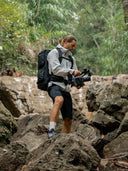 Multi-day hiking backpack with padded camera compartment and extra storage.