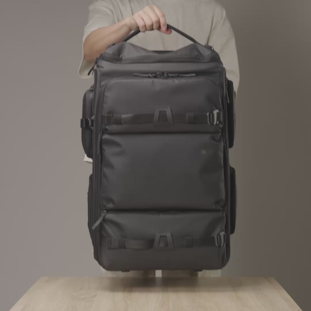 Video showcasing the Sakk Pack Cine Pro Roller packed with a cinema camera, multiple lenses, and filming accessories, demonstrating how everything fits neatly inside for organized storage and easy transport.
