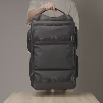 Video showcasing the Sakk Pack Cine Pro Roller packed with a cinema camera, multiple lenses, and filming accessories, demonstrating how everything fits neatly inside for organized storage and easy transport.