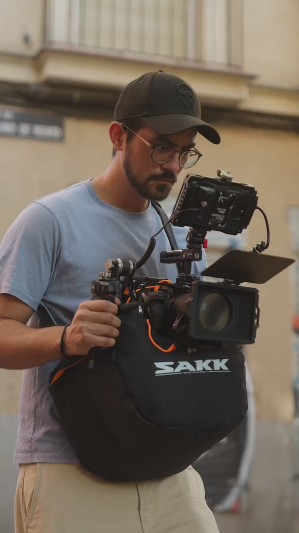 filmmaker using a camera saddle
