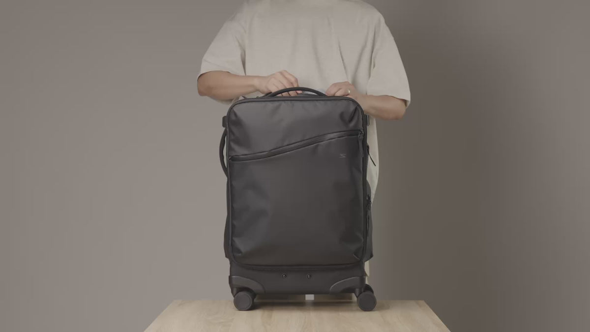Load video: Video showcasing the Ultra Shell Roller Camera Backpack packed with camera gear, lenses, and shooting essentials.
