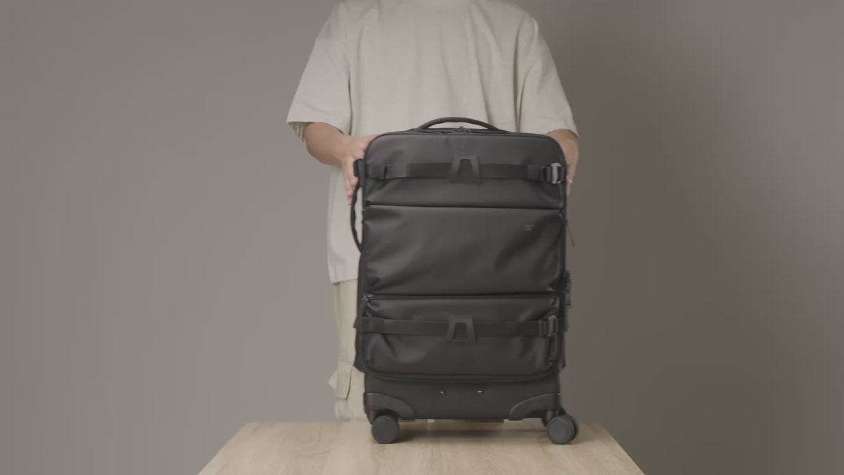 Load video: Video demonstrating the Sakk Pack Carry-On Roller's loadout, showing how camera bodies, lenses, and other filming essentials can be packed and organized inside the bag for easy travel.