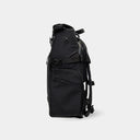 Slim side view showing compression strap, secure side pocket, and attachment point for modular gear add-ons.