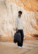 Travel photography backpack 28L with laptop sleeve, durable material, and easy-access storage.