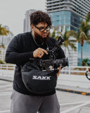 Durable canvas body filled with polystyrene beads, absorbs shake for smooth shots.